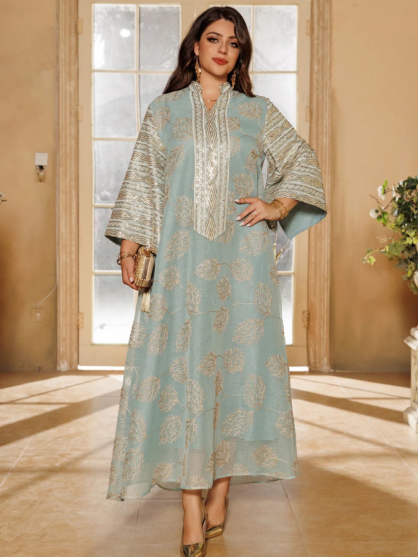 Muslim Women's Light Blue Islamic Embroidered Abaya with Gold Detailing Ideal for Formal Events in Middle East like UAE Saudi
